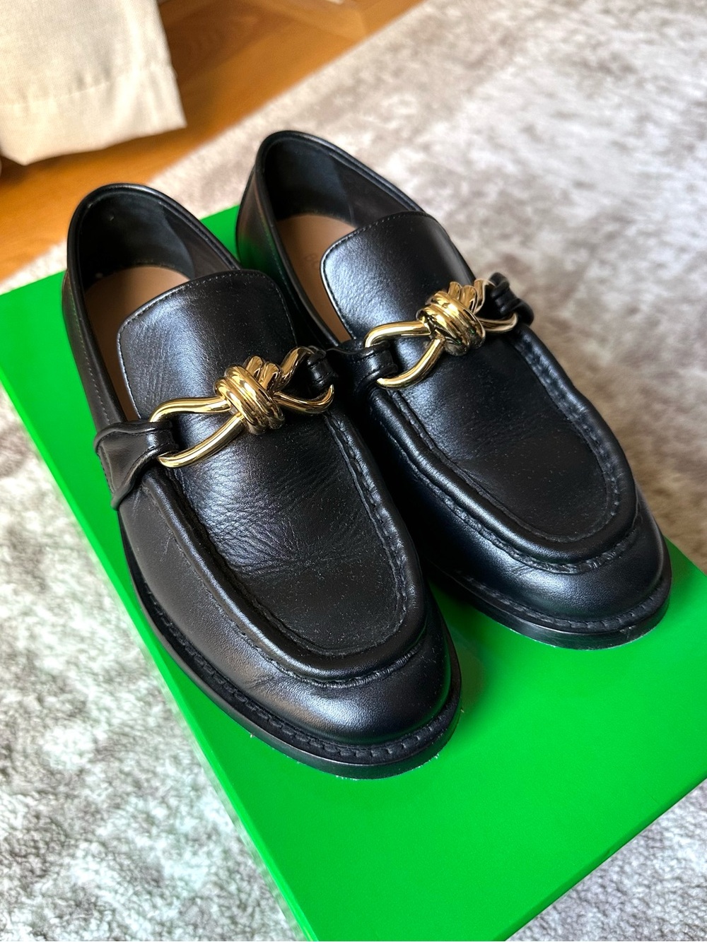 Bottega Veneta Black Leather Loafers with Gold Chain Hardware